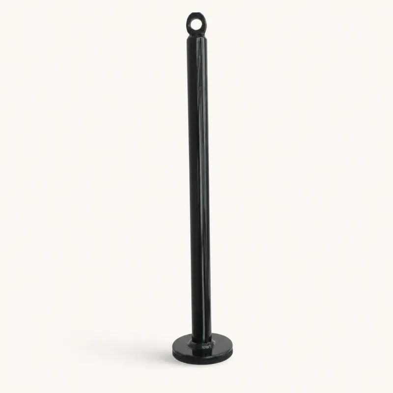 Black steel loading pin standing upright on its flat base